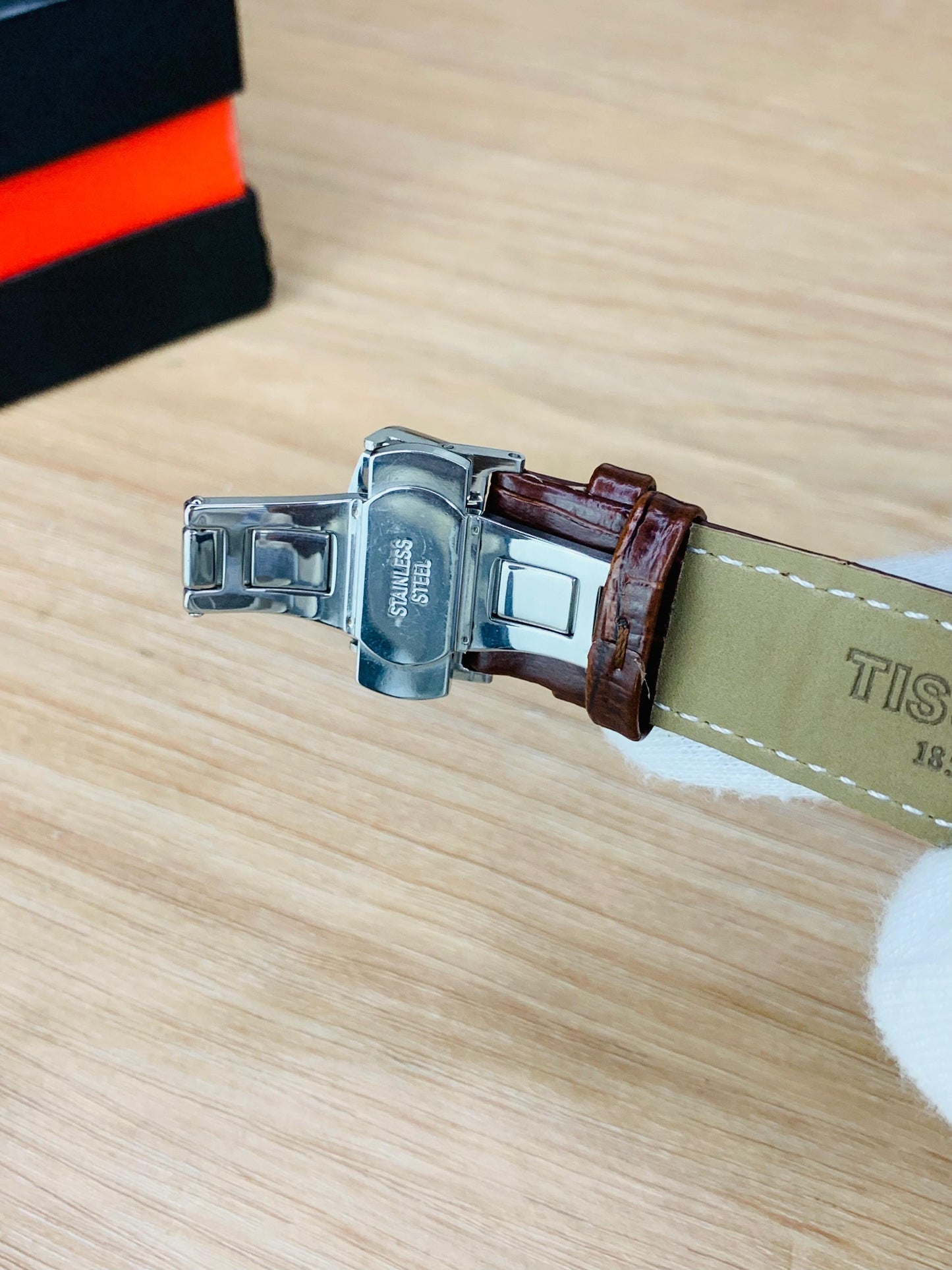 Classic Chronograph Watch with Textured Leather Strap and Multifunction Dial