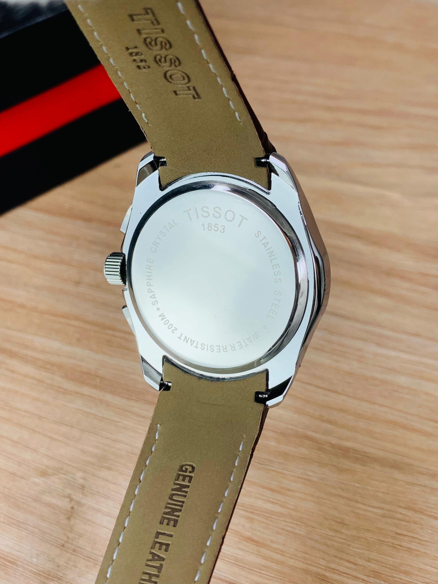 Classic Chronograph Watch with Textured Leather Strap and Multifunction Dial